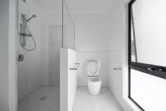 Bathroom with handrails